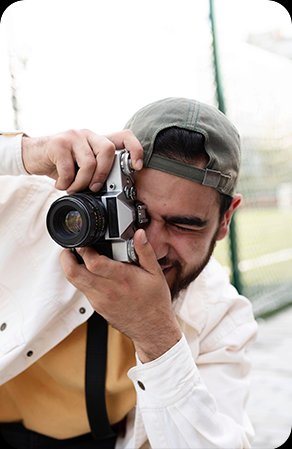 Photographer shooting with a film camera