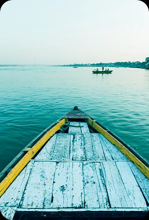 Wooden boat on a river at dawn